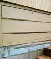 an old-fashioned crawl space door in Dalmeny about to be replaced
