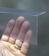 Closeup of a clear plastic covering on a Shellbrook crawl space block wall