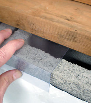 Block wall clear covering for wet crawl spaces in Shellbrook