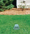 A buried gutter drain downspout extension installed in a Englefield home